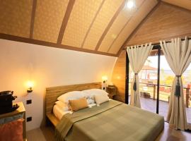 Kubotique Beachfront Staycation，位于爱妮岛的酒店