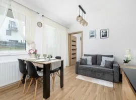 Elegant Apartment in Gliwice with Garden, Desk and Parking by Noclegi Renters