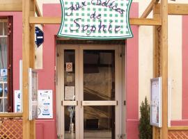 贸易酒店，位于普隆比埃莱班的酒店
