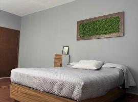 Departamento Moderno y Centrico check in autonomo no necesitas llaves，位于瓜伊马斯的酒店