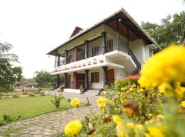 Mango Village Resort，位于Kollengode的酒店