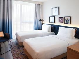 Hampton by Hilton Munich Airport South，位于哈尔伯格摩斯的酒店