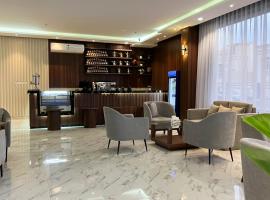 متسع للشقق المخدومة，位于哈伊勒的带停车场的酒店