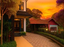 Munnar Tea Estate Cottage and Resort - Away From City Hustle，位于蒙纳的酒店