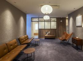 Apartment Hotel DIG the OSAKA，位于吹田的酒店
