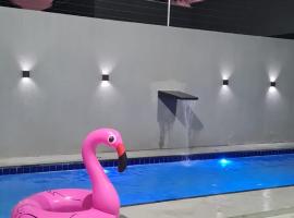 Casa Riso Dourado，位于帕拉库鲁的酒店