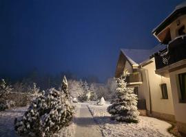 纳图拉家庭度假村，位于阿夫里格的酒店