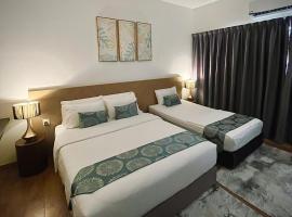 Putri Hotel at Mydin Tunjong，位于哥打巴鲁的带停车场的酒店