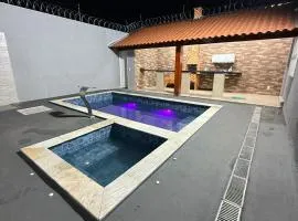 Casa Completa para temporada e hospedagem ótima localização, com piscina aquecida, churrasqueira em Uberaba, bairro Girassóis