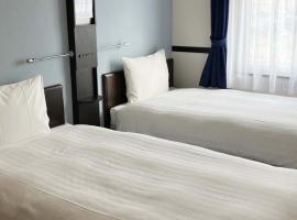 Toyoko Inn Shin takaoka eki Shinkansen Minami guchi，位于高冈市的酒店