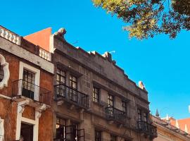 Hotel & hostal Morada，位于普埃布拉的住宿加早餐旅馆