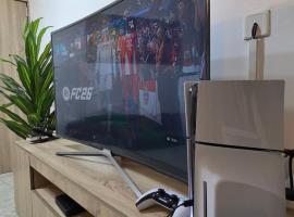 BDA Apartments - 1 Bed & Parlor with PlayStation 5, Steady Light, Fast Internet, Self Check-in, Mini Bar, Daily Housekeeping, Laundry Service，位于Wupa的酒店