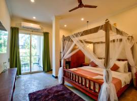 Hotel Dimaru Boutique ,Calangute Beach，位于卡兰古特的带泳池的酒店