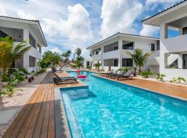 Palm Suite - Aan zwembad, dichtbij het strand，位于简蒂埃尔的酒店