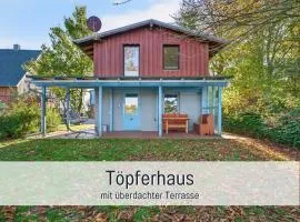 Ferienhaus Töpferhaus - strandnah, haustierfreundlich, Kaminofen, Garten, Platz für 3 Erwachsene, 2 Kinder