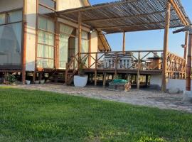Refugio 55 Casa de Playa en Chincha, Frente al mar，位于Chincha Baja的乡村别墅