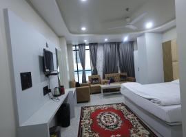 Hotel Ganesha - residential，位于穆扎夫法尔普尔的酒店