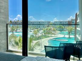 Flat Pé na Areia - Muro Alto，位于伊波茹卡的酒店