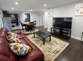 Cozy 3BR Caledon Basement Suite with Private Access, Full Kitchen, WiFi, Laundry, Backyard Basketball Court & Creek Trail, 5 Mins to Brampton! Great for Families & Long Stays!