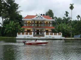 Mango Kerala Homes，位于库玛拉孔Kumarakom Bird Sanctuary附近的酒店