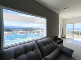 Apto Cobertura com Piscina 08 pessoas 03 dormitórios Bertioga SP Frente Mar