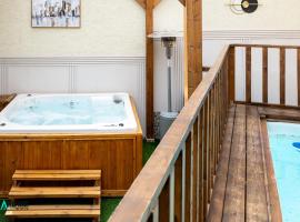 צימר לה מונטנייה，位于Dāliyat el Karmil的带热水浴缸的酒店