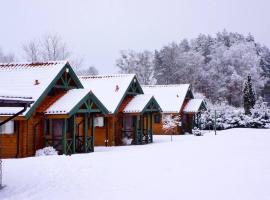 Domki Mazurskie w Ogrodach Złotej Łani Wiartel - Klimatyczne Apartamenty i Pokoje Widokowe，位于维亚特尔的酒店