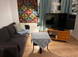 Sentralt og koselig，位于克里斯蒂安桑的自助式住宿