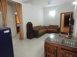 1bhk Kalp Guruvayur 200m to temple，位于德里久尔的酒店