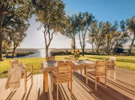 Watermark Usedom - Premium Ferienhaus direkt am Wasser mit eigener Badestelle - Haus Welle