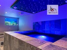 Gites Spa Strasbourg - Villa Gorille - SPA Privé, Sauna, Borne d'arcade, Babyfoot，位于Ittenheim的酒店