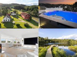 Luksusfølelse i hjertet av naturen med jacuzzi，位于Norem的酒店