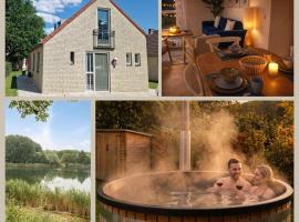 Hottub cottage deluxe, BBQ, 6p aan meer Gelderland，位于Ewijk的酒店