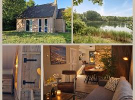 Gezellig 6pers Familiehuis grote tuin met BBQ aan meer Gelderland，位于Ewijk的酒店