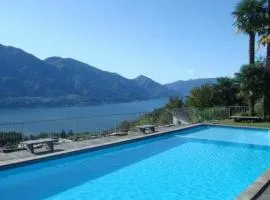 Apartment Seeblick und Pool by Interhome