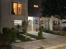 Casa completa, Zona note tsm, 3 dormitorios, 1 baño completo y medio, asador y jardín，位于托雷翁的酒店