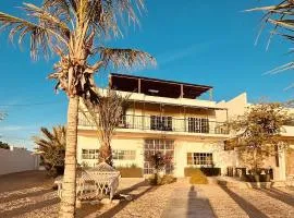 Bed and Cactus - Ocean View Villa - 360 Rooftop view and Workspace