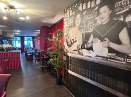 Hotel Le Divona "au coeur de Divonne"，位于迪沃讷莱班的酒店