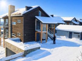 Utsiktsleilighet med ski in out på Hafjell 7 sengeplasser，位于Hunder的酒店