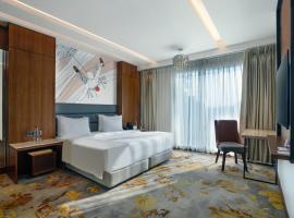 德拉敦福朋喜来登酒店，位于德拉敦的酒店