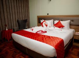 TJ's Boutique Hotel，位于埃尔多雷特的酒店