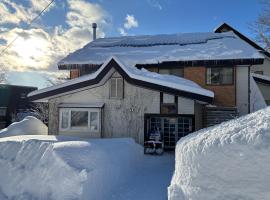 Guest House Tomo，位于饭山市的酒店