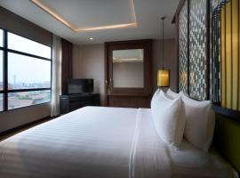 万荣市阿玛里酒店，位于万荣的酒店