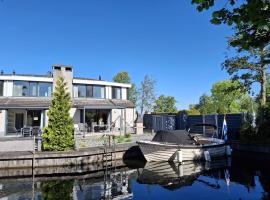 Ferienhaus am Wasser Achterhoek Nr 183，位于莱米尔的酒店