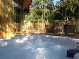The Crannog Circular Riverside Retreat with Hot Tub