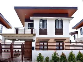 Lipa City Getaway Bright & Modern 2BR，位于利帕的酒店