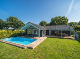 Ferienhaus mit Pool und Sauna am Duemmer See，位于Dümmer的酒店