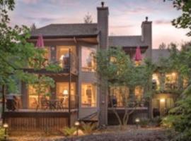 Whispering Woods Resort，位于韦尔奇的酒店