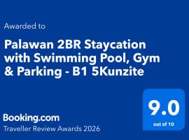 Palawan 2BR Staycation with Swimming Pool, Gym & Parking - B1 5Kunzite，位于公主港的分契式公寓
