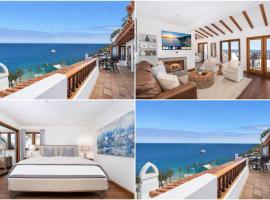 10-Star Property! Premium Ocean Views, Immaculate Corner Condo with Fireplace, New Golf Cart，位于阿瓦隆的酒店